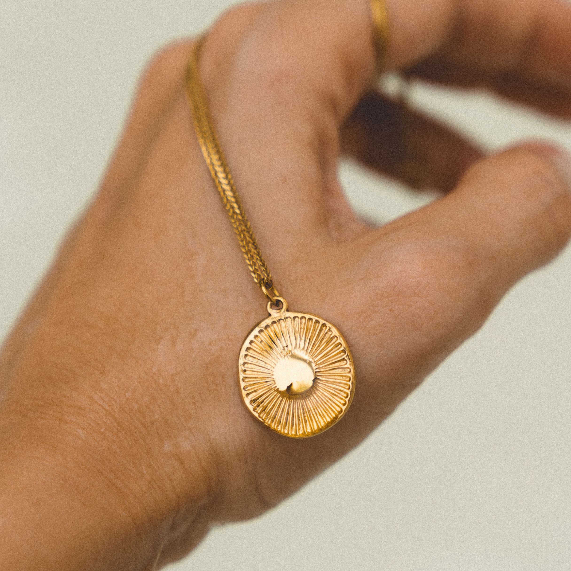 Vintage sun pendant